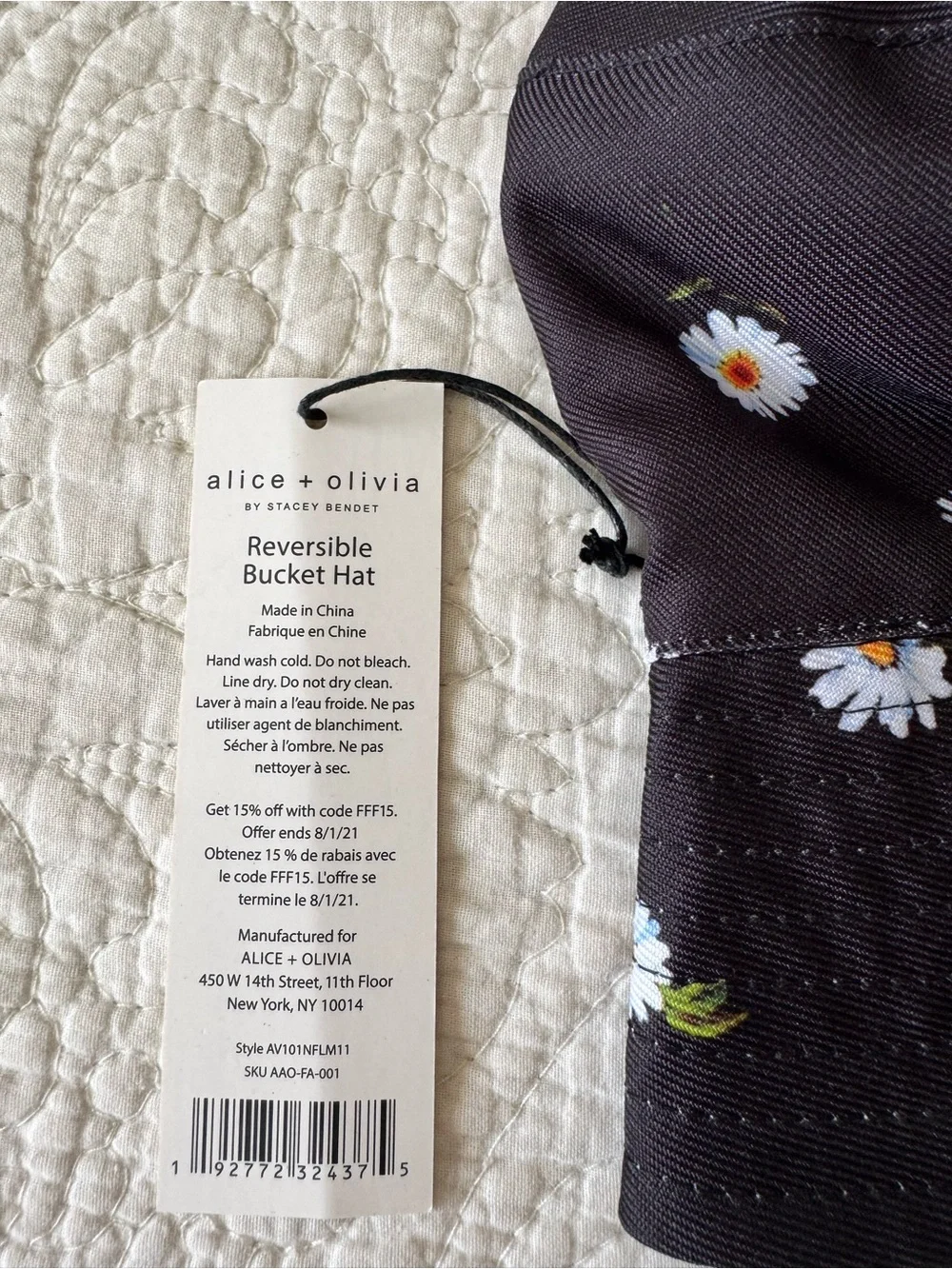 Alice + Olivia Reversible Black Daisy Bucket Hat with White Blossoms